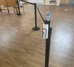 Queue barriers in use at a medical centre.